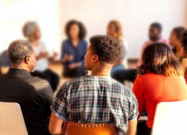 People attending a workshop discussion